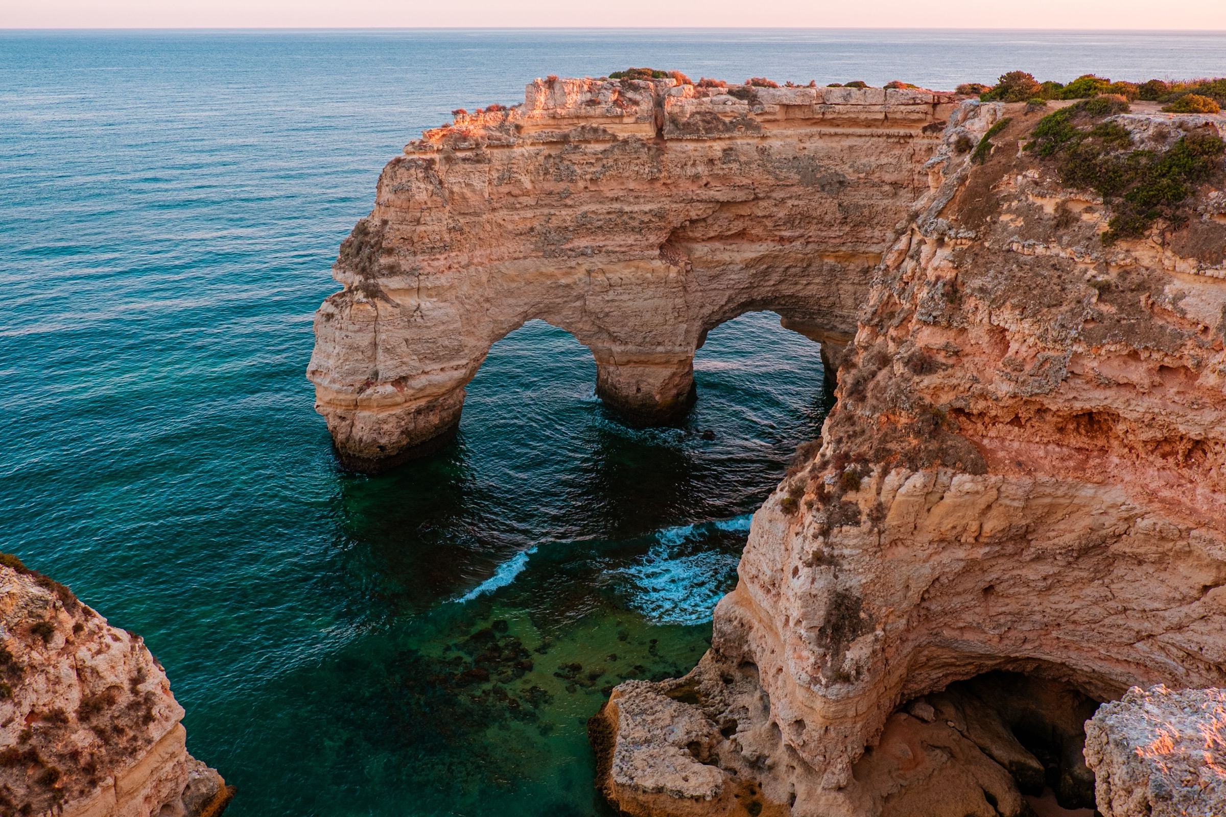Rock arch and coastline in the Algarve, Portugal