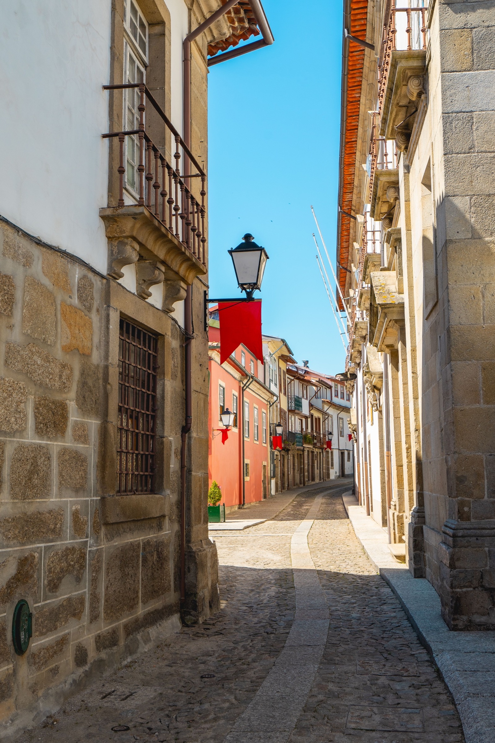 Historic street and stone buildings in Guimarães Portugal