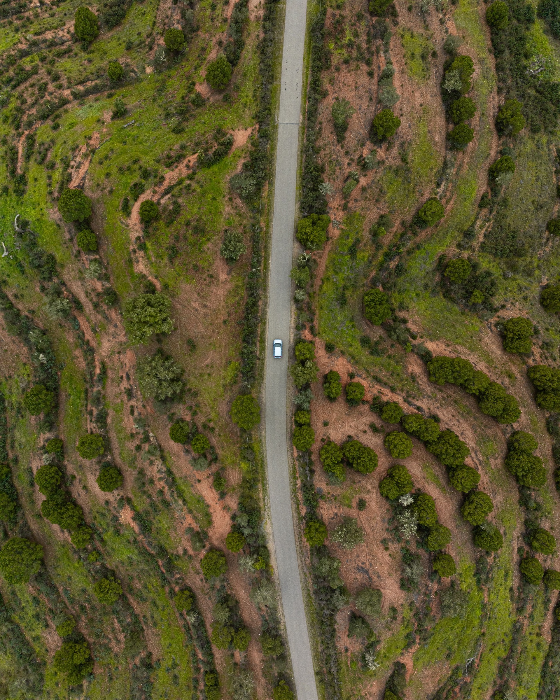 Car travelling along an open road in Portugal